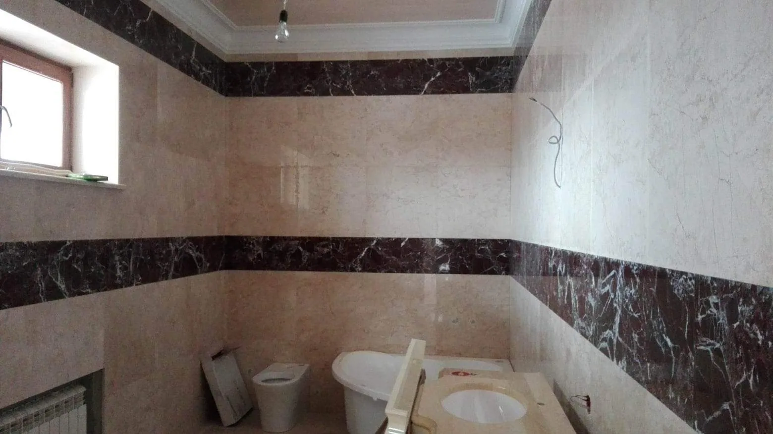 Marble Bathroom Wall Installation — In Progress